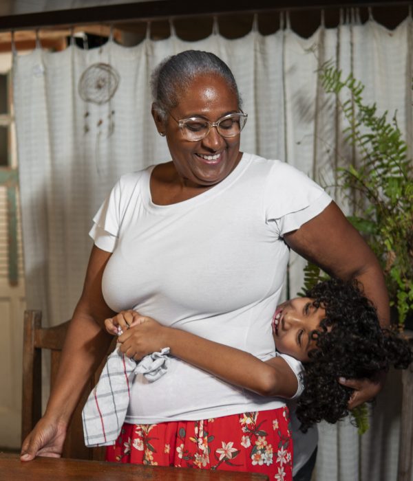 front-view-brazilian-family-cooking-tasty-desserts